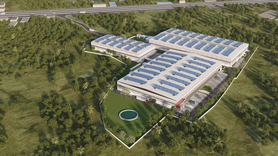 Aerial view of the park with three warehouse buildings and rooftop solar